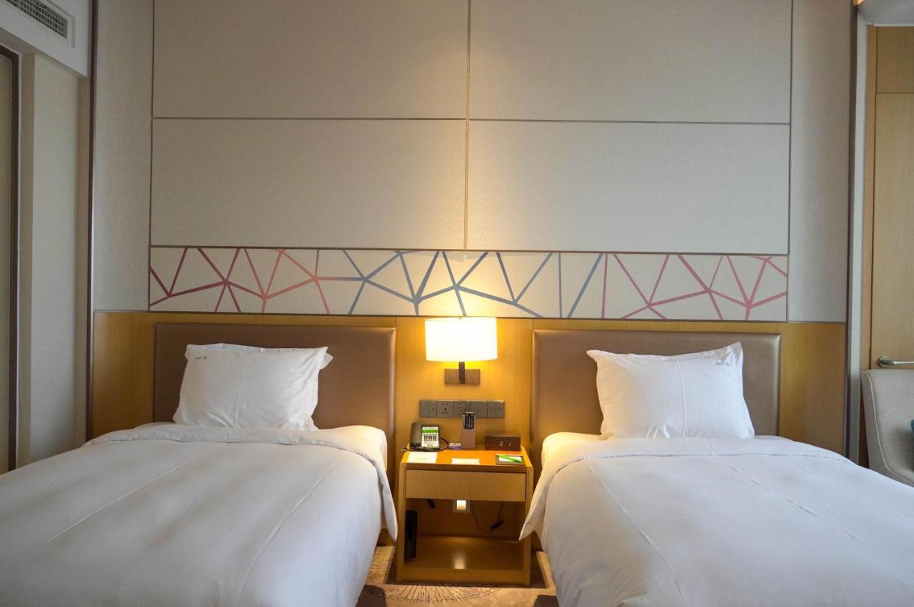 Holiday Inn Tianjin Xiqing By Ihg Esterno foto